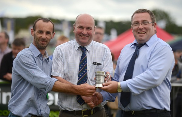 Trevor Chadwick, Chairman Pedigree Section at Tullamore Show & Tom Maloney ISCS make a Presentation to the Simmental Judge Michael Durno